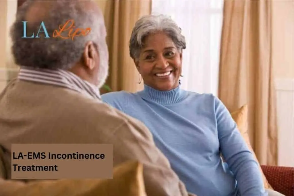 Couple sat smiling at each other - LA-EMS treatment Chiswick