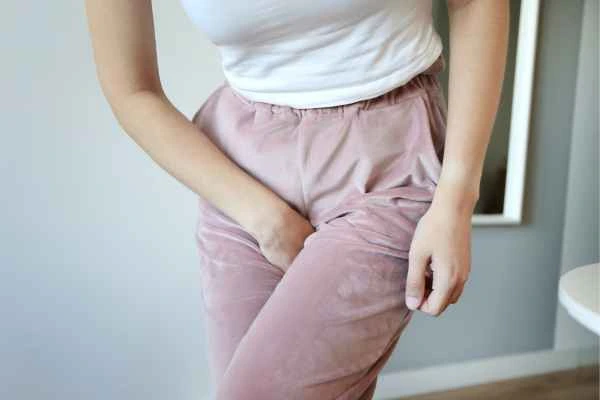 woman struggling with urine incontinence Chiswick
