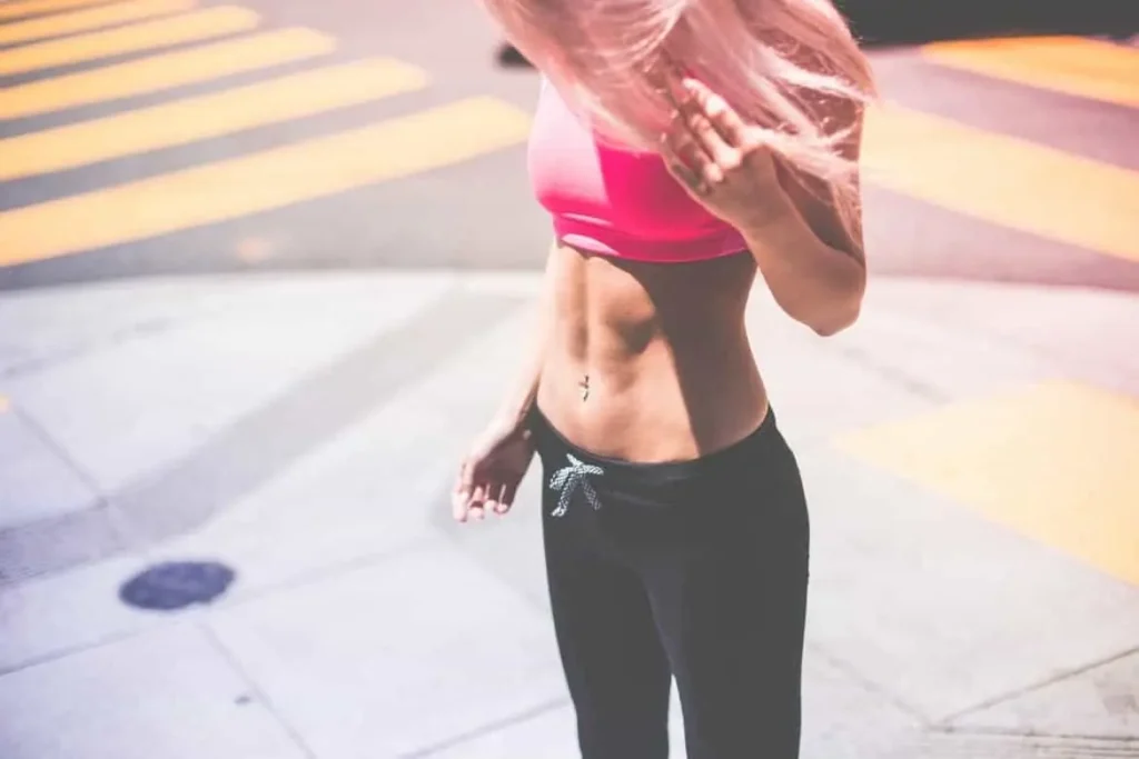Woman with toned stomach after LA-EMS Body Sculpting Treatment Chiswick